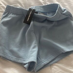 Cocoburry NWT women Light Blue Athletic Shorts size Small will fit Med